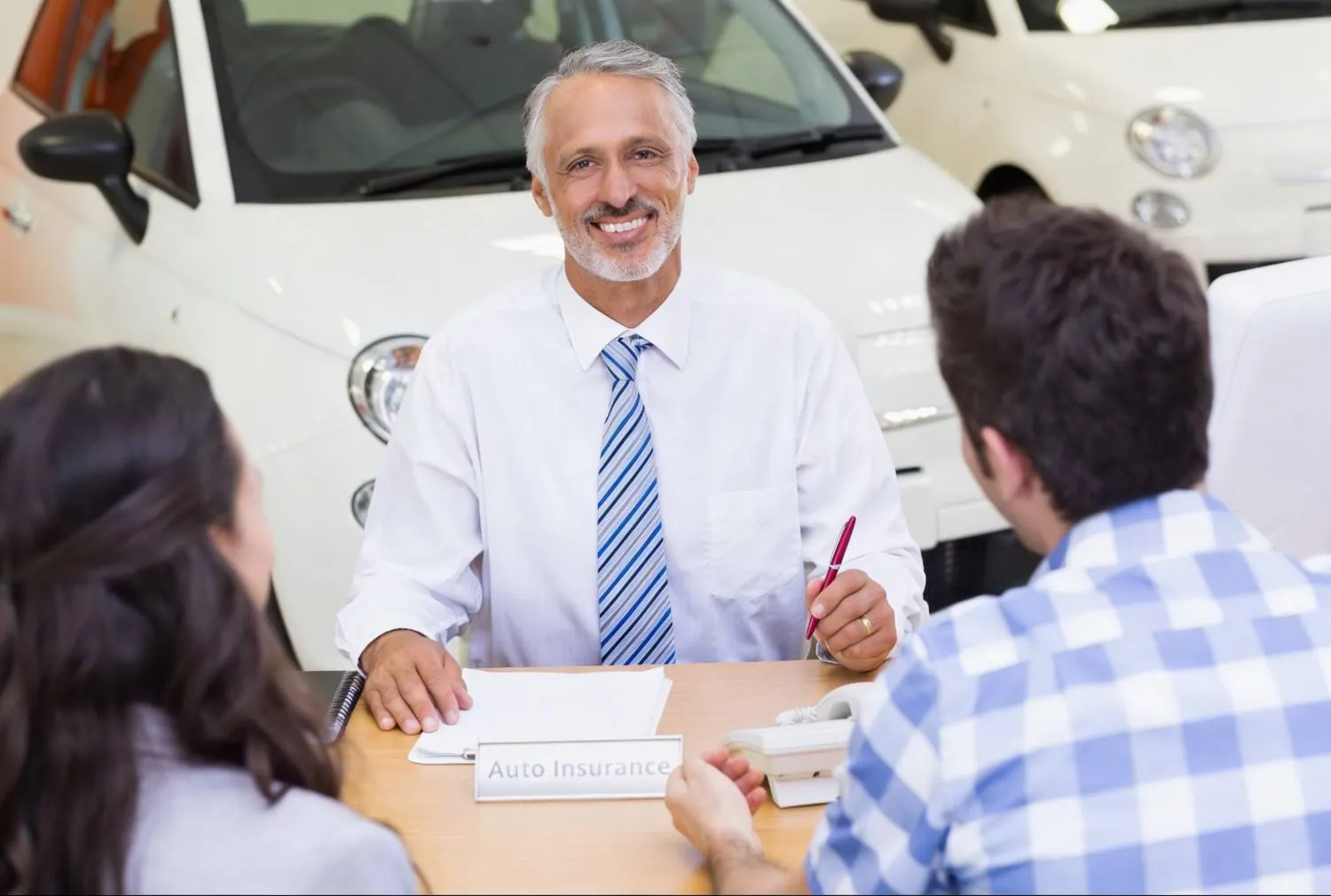 Car owner reviewing policy